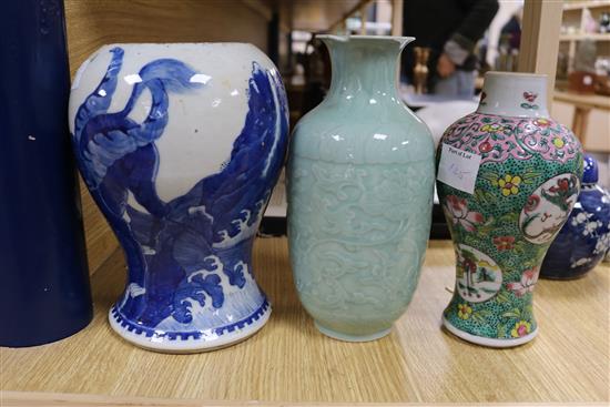 A Chinese blue and white dragon vase, a figure, two jars, teabowl and a famille verte vase